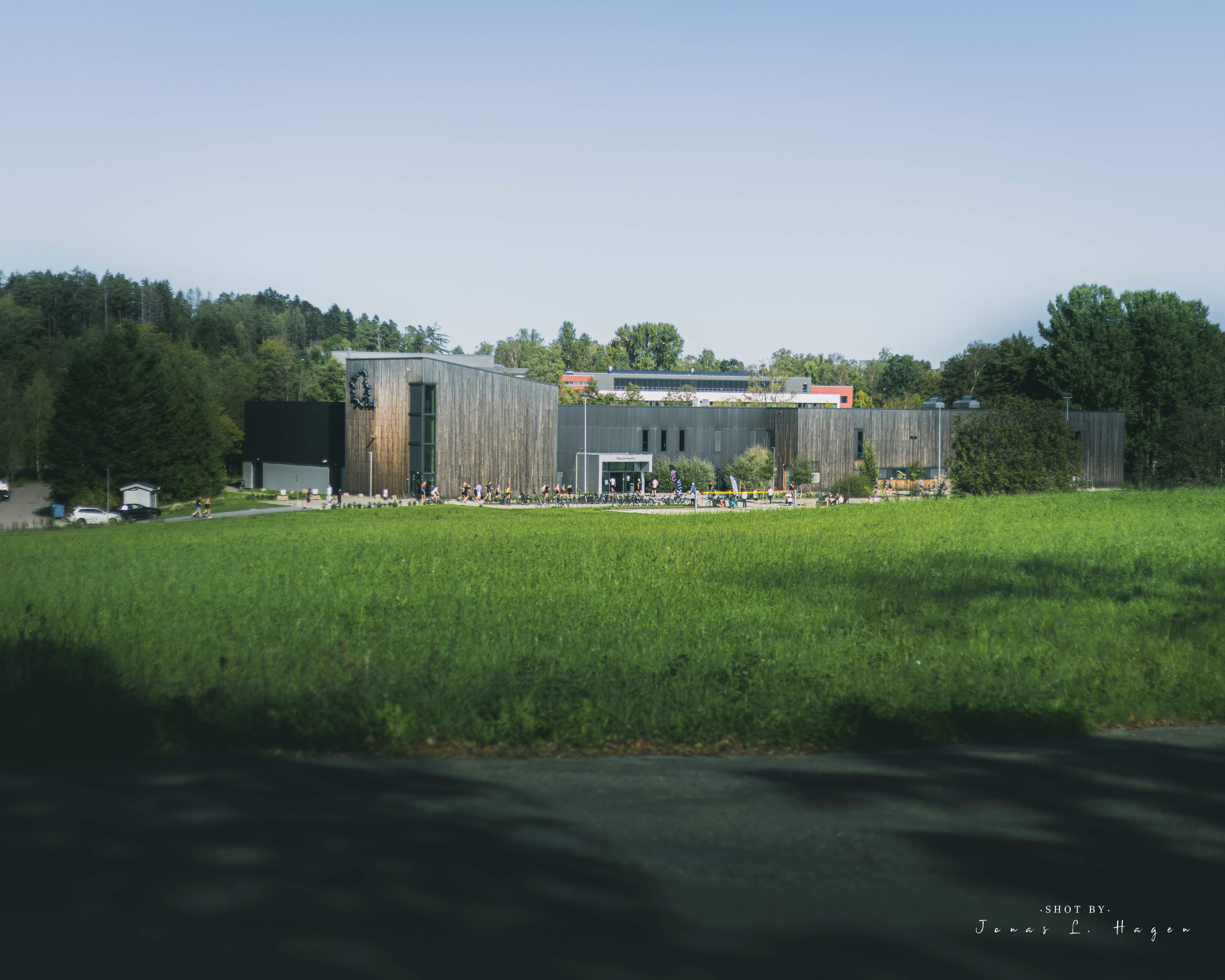 Backyard As venue - main building surrounded by green fields